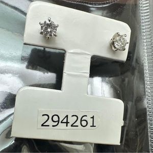 Pair of brand new diamond (natural) stud earrings.